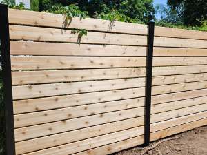 Lumen Landscaping | Deck & Fence New horizontal cedar board fence with black posts
