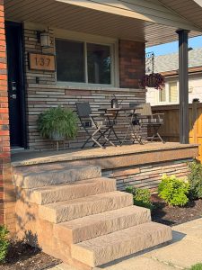 hardscaping-13 Natural stone front steps leading up to a covered porch