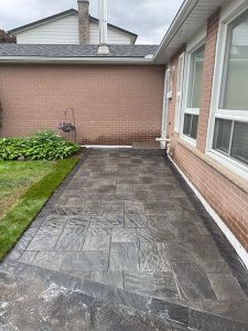 Lumen Landscaping | Interlock Interlock walkway along the side of a home