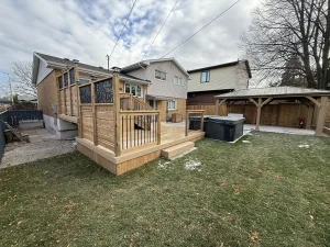 Lumen Landscaping | Fences and Gates New wood deck with privacy screens beside a hot tub and a wood pavilion in a backyard